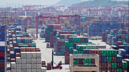 Containers are seen at the Yangshan Deep Water Port in Shanghai, China August 6, 2019/Reuters 