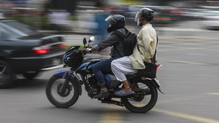 A biker in Dhaka changes lanes six times a minute