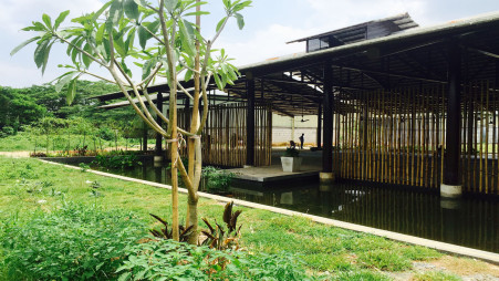 The introduction of a water body, bamboo screen, high ceiling and other vernacular elements substantially reduce electricity costs by eliminating the need for air conditioning and artificial lighting and making the space cool and comfortable to work in.Photo: Jubair Hasan
