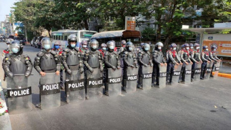 Riot police line up during a demonstration against the military coup in Yangon, Myanmar, February 6, 2021. Myanmar Now/Handout via REUTERS THIS IMAGE HAS BEEN SUPPLIED BY A THIRD PARTY. MANDATORY CREDIT. NO RESALES. NO ARCHIVES