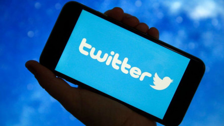 The name and logo of &quot;Twitter&quot;can be seen on a phone. Photo: GETTY IMAGES VIA BBC