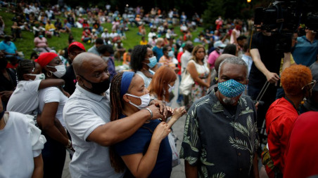 People gather at St. Nicholas Park to celebrate Juneteenth, which commemorates the end of slavery in Texas, two years after the 1863 Emancipation Proclamation freed slaves elsewhere in the United States, in New York City, New York, U.S., June 18, 2021. REUTERS/Eduardo Munoz