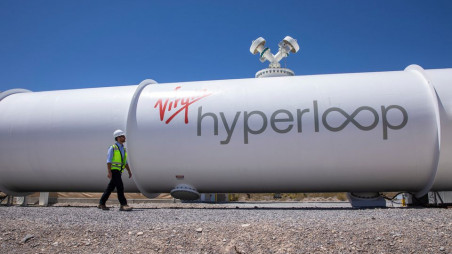 Josh Giegel, co-founder and CEO of Virgin Hyperloop, walks next to a hyperloop tube at the company's hyperloop facility near Las Vegas, Nevada, May 5, 2021. Photo :Reuters
