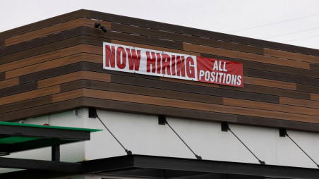 A restaurant advertising jobs looks to attract workers in Oceanside, California, US, May 10, 2021. Photo: Reuters