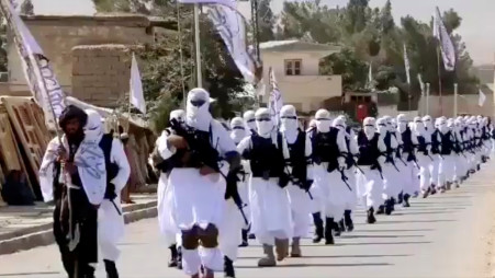 Taliban fighters march in uniforms on the street in Qalat, Zabul Province, Afghanistan, in this still image taken from social media video uploaded August 19, 2021. Photo: Reuters