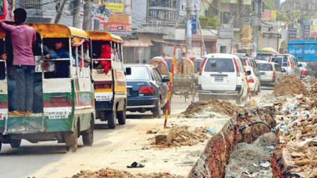Dug-up roads add to traffic woes  