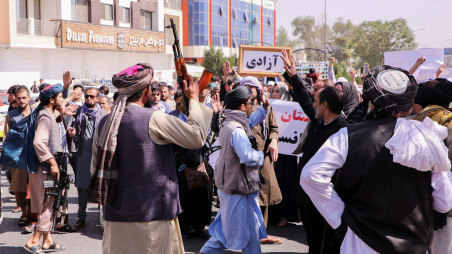 Taliban forces try to stop the protesters, as they shout slogans during an anti-Pakistan protest, near the Pakistan embassy in Kabul, Afghanistan, September 7, 2021. REUTERS/Stringer