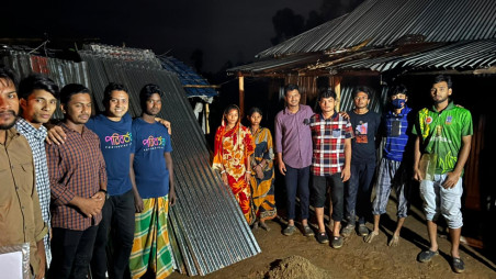 Poriborton Kori Foundation rebuilds house destroyed in communal violence in Pirganj