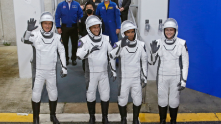 European Space Agency (ESA) astronaut Matthias Maurer of Germany, NASA astronauts Raja Chari, Tom Marshburn, and Kayla Barron wave while departing the crew quarters for launch aboard a SpaceX Falcon 9 rocket on a mission to the International Space Station at the Kennedy Space