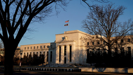 The Federal Reserve building is seen before the Federal Reserve board is expected to signal plans to raise interest rates in March as it focuses on fighting inflation in Washington, U.S., January 26, 2022. REUTERS/Joshua Roberts/File Photo