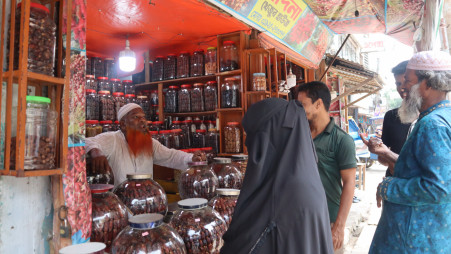 Shahidul Islam, owner of Madina Dates House, was indeed aware of people’s curiosity about his store and was genuinely proud of it. Photo: Masum Billah