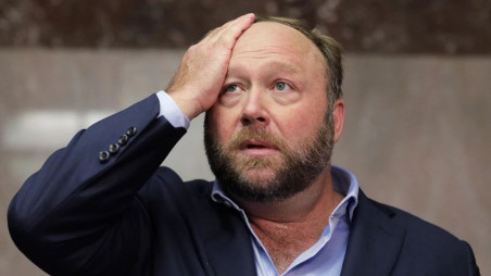 Alex Jones of Infowars talks to the media while visiting the U.S. Senate's Dirksen Senate office building as Twitter CEO Jack Dorsey testifies before a Senate Intelligence Committee hearing on Capitol Hill in Washington, U.S., September 5, 2018. Twitter permanently banned Jones and Infowars from its platforms September 6 over his actions seen on Twitter while visiting the building. REUTERS/Jim Bourg