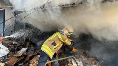 A firefighter works at a compound of a market destroyed by a Russian missile strike, as Russia's attack on Ukraine continues, in Bakhmut, Donetsk region, Ukraine July 30, 2022. Press service of the State Emergency Service of Ukraine/Handout via REUTERS


