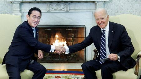 U.S. President Joe Biden shakes hands with Japanese Prime Minister Fumio Kishida during a bilateral meeting in the Oval Office of the White House in Washington, U.S., January 13, 2023. REUTERS/Jonathan Ernst