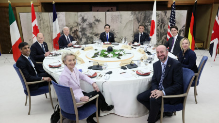 U.S. President Joe Biden, Germany's Chancellor Olaf Scholz, Britain's Prime Minister Rishi Sunak, European Commission President Ursula von der Leyen, President of the European Council Charles Michel, Italy's Prime Minister Giorgia Meloni, Canada's Prime Minister Justin Trudeau, France's President Emmanuel Macron and Japan's Prime Minister Fumio Kishida attend a working dinner session during G7 leaders' summit in Hatsukaichi, Hiroshima prefecture, western Japan 19 May, 2023, in this handout photo released by Ministry of Foreign Affairs of Japan. Ministry of Foreign Affairs of Japan/HANDOUT via REUTERS
