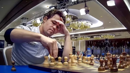 Carlsen showing appreciation for Praggnanandhaa at end of draw