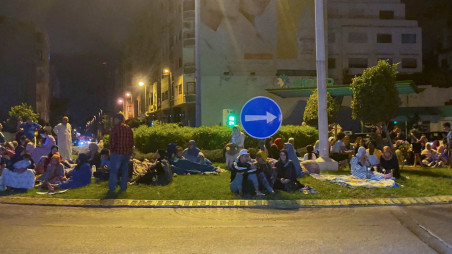 People gather on a street in Casablanca, following a powerful earthquake in Morocco, September 9, 2023. REUTERS/Abdelhak Balhaki


