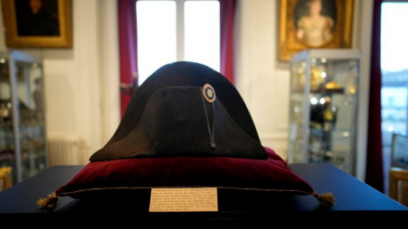 One of the signature broad, black hats that Napoléon wore when he ruled 19th century France and waged war in Europe is on display at Osenat's auction house in Fontainebleau, south of Paris, Friday, Nov. 17, 2023. The hat is tipped to fetch more than half a million euros (dollars) at the auction Sunday of Napoleonic memorabilia patiently collected by a French industrialist. (AP Photo/Christophe Ena)