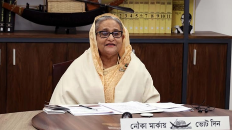 Prime Minister Sheikh Hasina addresses the election rallies in five districts together from the AL office at Tejgaon on Thursday afternoon. Photo: BSS


