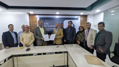 Senior officials of The Business Standard and Friendship pose for a photograph after signing a  memorandum of understanding to forge strategic partnership at the TBS office in the capital’s Eskaton Garden area on Tuesday. Photo: TBS