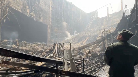 A member of the Investigative Committee of Russia works at the scene of the deadly shooting attack in Crocus City Hall concert venue, in the Moscow Region, Russia 23 March 2024, in this still image taken from a handout video. Photo: Russian Investigative Committee/Handout via REUTERS