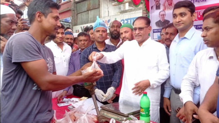 Livestock and Fisheries Minister Abdur Rahman inaugurates the sale of milk, eggs, and beef at fair prices in Madhukhali of Faridpur on Saturday. Photo: Courtesy