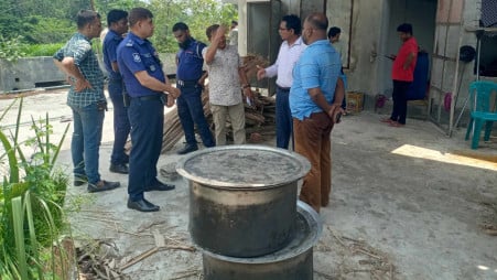 Two huge pots of beef confiscated by the executive magistrate today (2 June) at Babuganj upazila. Photo: Courtesy 
