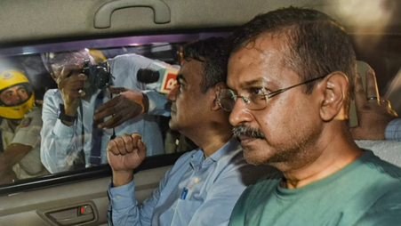 CBI officials leave with Delhi Chief Minister Arvind Kejriwal from the Rouse Avenue Court after the court sent him to the probe agency custody in the excise policy case, in New Delhi on 26 June. Photo: PTI