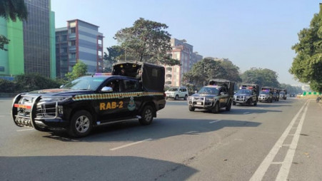 RAB vehicles plying city streets ahead on 7 January elections. Photo: BSS