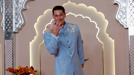 John Cena poses for pictures on the red carpet on the day of the wedding of Anant Ambani and Radhika Merchant in Mumbai. Photo: Collected