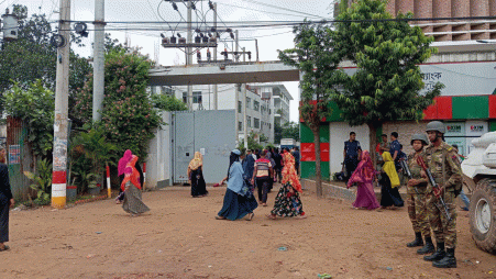Workers of a factory in Ashulia enter their work[place on 25 September. Photo: TBS