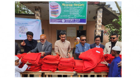 Karmasangsthan Bank distribution of winter clothes
