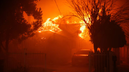 A house burns as powerful winds fueling devastating wildfires in the Los Angeles area force people to evacuate, at the Eaton Fire in Altadena, California, US on 8 January 2025. Photo: Reuters