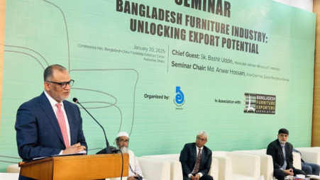 Commerce Adviser Sk Bashir Uddin speaks at a seminar titled 'Bangladesh Furniture Industry: Unveiling Export Potential' at the Bangladesh-China Friendship Exhibition Center in Purbachal today (20 January). Photo: PID