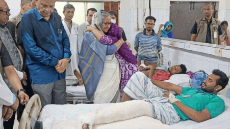 Photo shows Sheikh Hasina, during a visit to NITOR in Dhaka, consoling the family member of a person who was injured during the protests in July last year. Photo: Focus Bangla