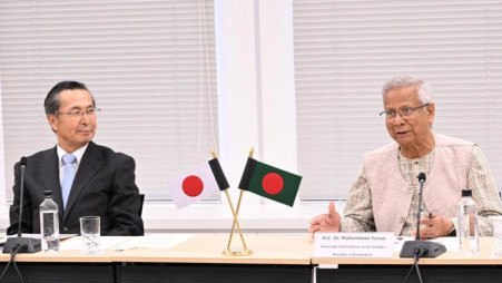 Chief Adviser Muhammad Yunus speaks at a roundtable discussion organised by the Japan External Trade Organization (JETRO) at its office in Tokyo on 30 May. Photo: UNB