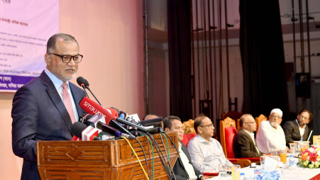 Commerce Adviser Sk Bashir Uddin speaks at a programme held at TCB building auditorium in the city on 18 June 2025. Photo: PID
