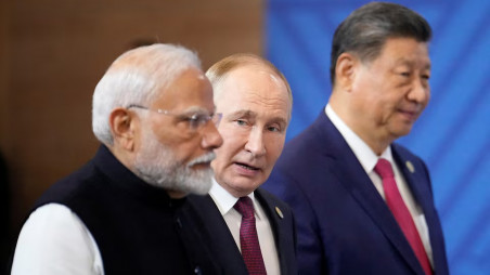 Indian Prime Minister Narendra Modi, Russian President Vladimir Putin and Chinese President Xi Jinping attend a family photo ceremony prior to the BRICS Summit plenary session in Kazan, Russia, Wednesday, Oct. 23, 2024. Alexander Zemlianichenko/Pool via REUTERS/File Photo