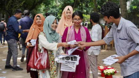 A candidate distributes leaflets to students marking Ducsu election at Dhaka University on 7 September 2025. Photo: UNB