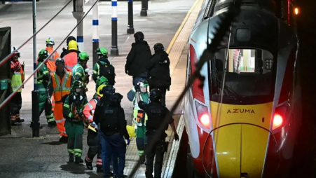 Police operate near the scene after a series of stabbings on a train near Cambridge, Britain, November 1, 2025. Photo: AFP