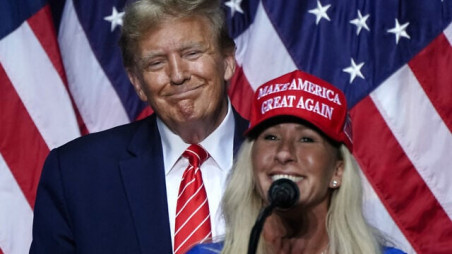 US Rep. Marjorie Taylor Greene, Republican of Georgia, US President Donald Trump, at a campaign event in Rome, Georgia, on March 9, 2024 / AFP