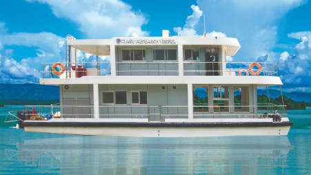 Once central to aquatic research, CVASU’s floating vessel now lies anchored on Kaptai Lake after engine failures forced it out of service, leaving smaller boats to deliver samples to its stationary lab. Photo: Collected