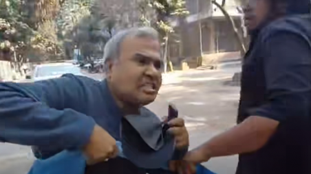 The incident occurred around 2pm at the Faculty of Social Sciences building, a video of which later spread on social media where Jubayer was seen attempting to restrain Professor Jamal on the department’s staircase to hand him over to the police/Screengrab
