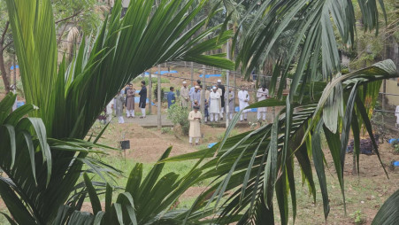 People offer prayers at graves for their loved ones, marking Eid, in Mugda graveyard, Dhaka, on 21 March 2026. Photo: Tashahud Ahamed Rafim