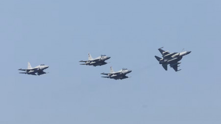 Pakistan Air Force's JF-17 Thunder jets fly past during the sea phase of Pakistan Navy's Multinational Exercise AMAN-23, in the North Arabian Sea near Karachi, Pakistan, 13 February 2023. REUTERS/Akhtar Soomro/File Photo