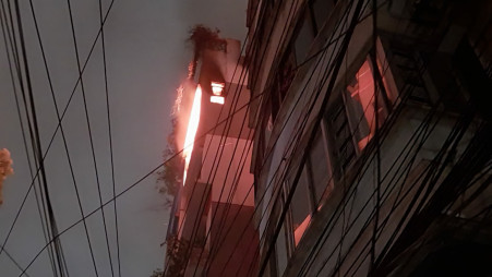 Fire broke out at a seven-storey residential building in Chattogram today. Photo: TBS