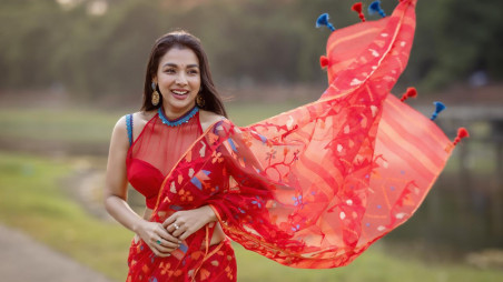  Red on red- an embellished sleeveless blouse with ornamental strap. Photo: Dustcoat

