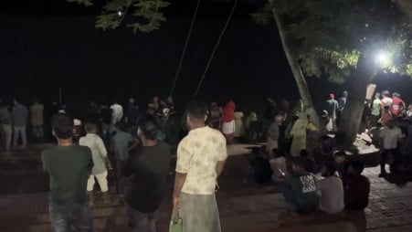 Large crowd gathers at the shrine area following the incident. Photo: TBS