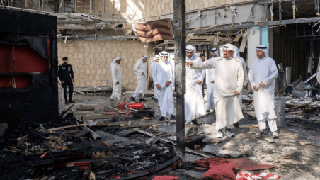 Officials inspect damage at Kuwait International Airport, 3 June 2026. Photo: Reuters