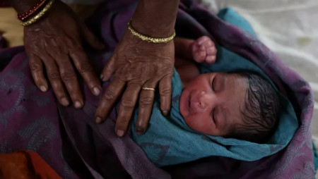A nurse cares for a newborn baby at a hospital in Kishanganj district in Bihar state Photo: Anushree Fadnavis/Reuters/FILE PHOTO